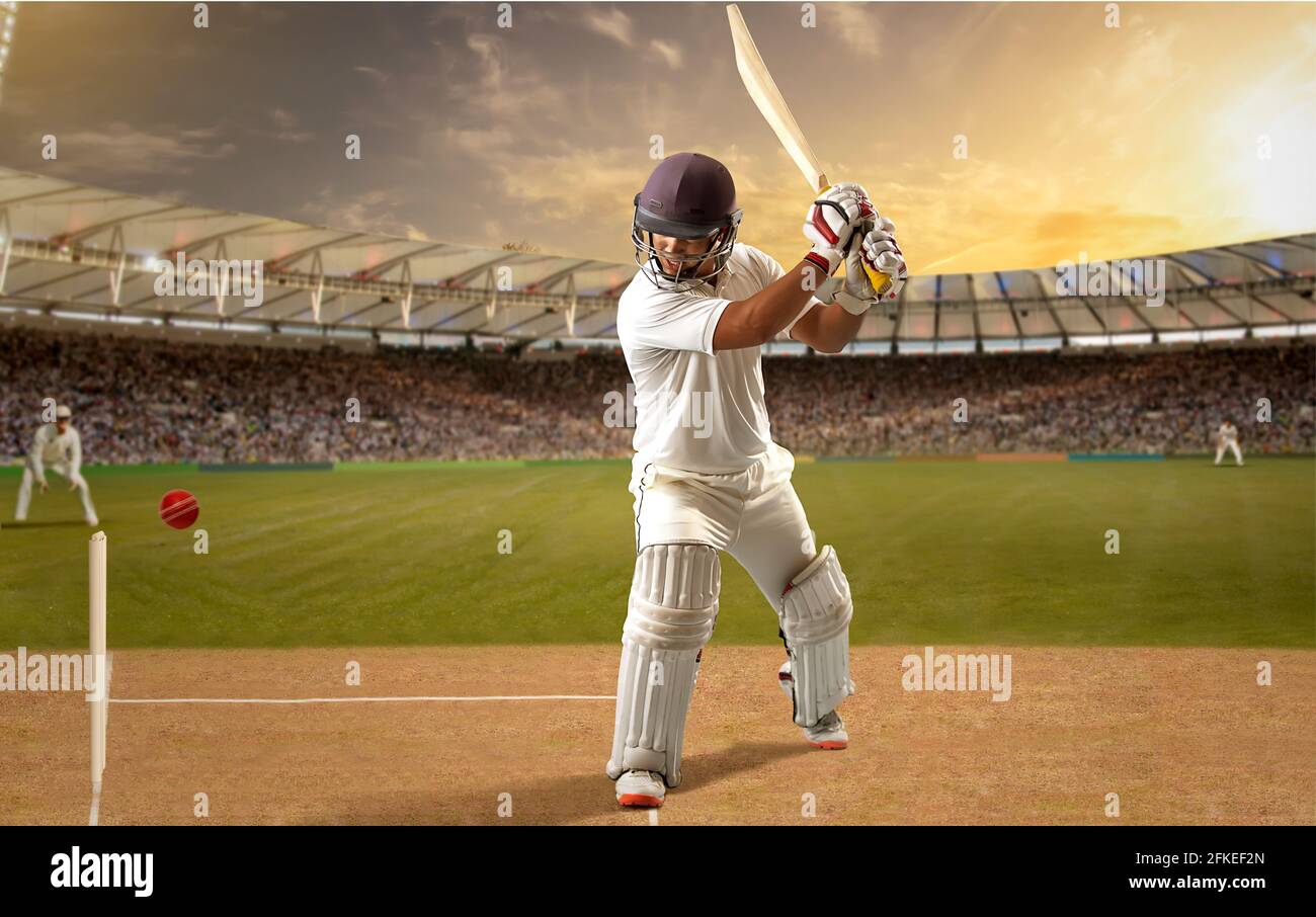 Cricketer, batsman hitting a shot Stock Photo Alamy