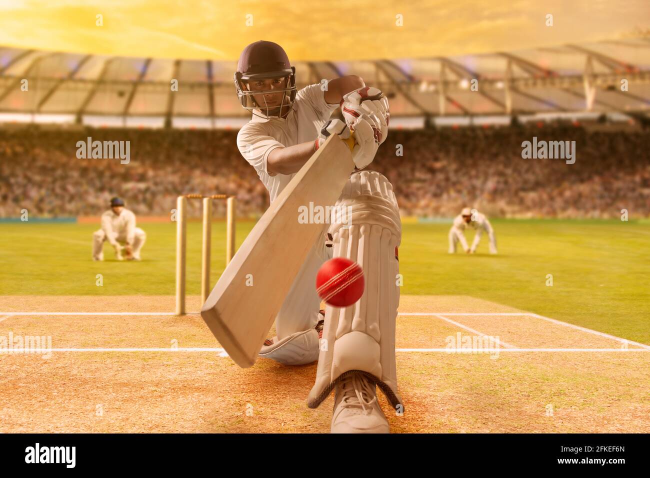 Batsman Hitting the Ball During Cricket Match In Stadium Stock Photo Alamy
