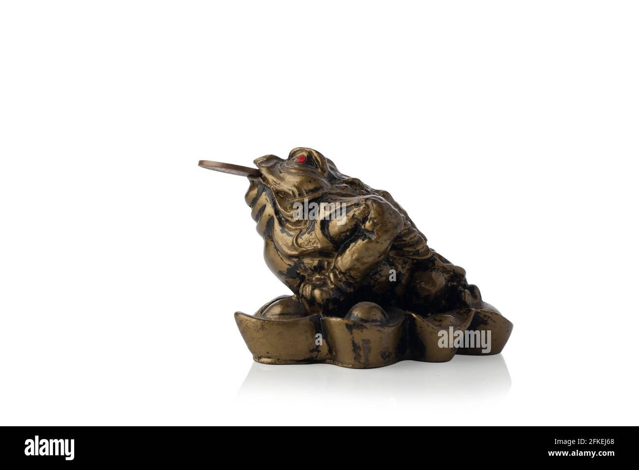 Chinese Feng Shui lucky money frog with coin isolated on white
