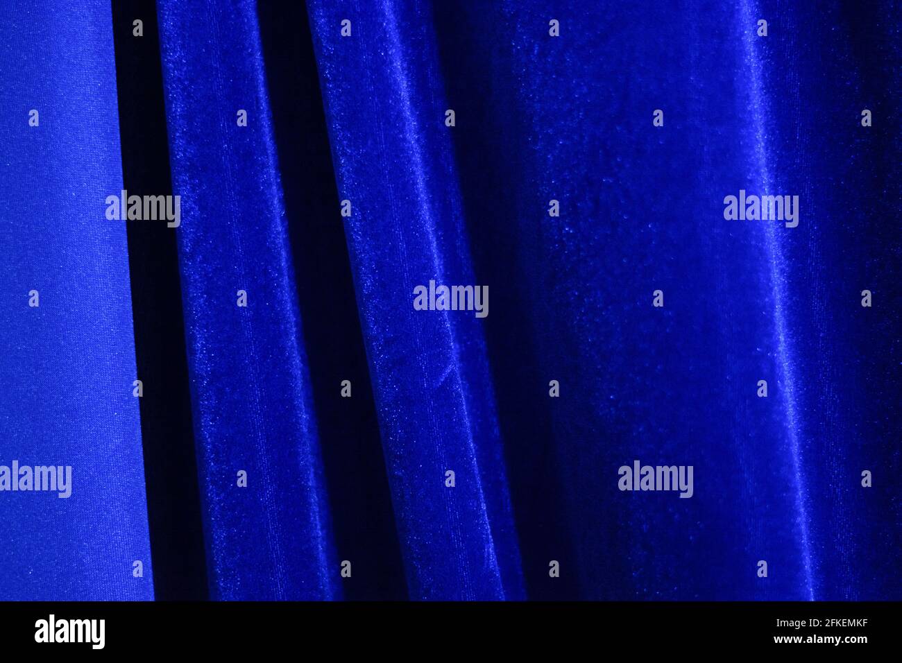 blue velvet fabric in pleats Stock Photo