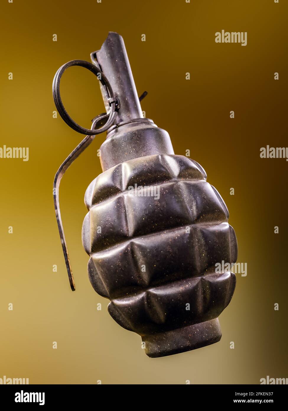 Old hand grenade shot on blurred background Stock Photo - Alamy