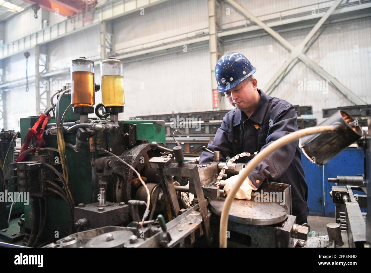 (210501) -- BEIJING, May 1, 2021 (Xinhua) -- Gao Lihua works at a workshop of Harbin Air Conditioning Co., Ltd. in Harbin, northeast China's Heilongjiang Province, April 29, 2021. Carrying the title of National Model Worker, Gao has been working at the company for 36 years since 1985 and is skilled to manufacture key parts of air handling units of nuclear power plant.  China marks International Labor Day on May 1 each year.International Workers' Day, also known as May Day, is observed on May 1 in China. Portraits of model workers from Liaoning, Heilongjiang and Jilin, were pictured by photogra Stock Photo