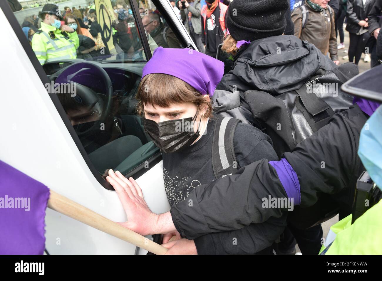Trafalgar Square, London, UK. 1st May 2021. Kill the Bill protesters in Trafalgar Square.  Police try to stop a van with a sound system from entering the square. Credit: Matthew Chattle/Alamy Live News Stock Photo