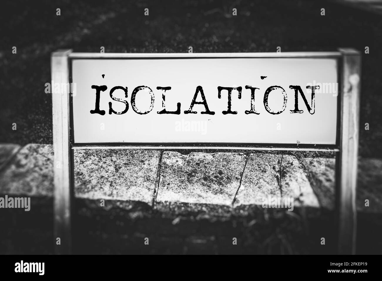 Isolation displayed on a street sign Stock Photo