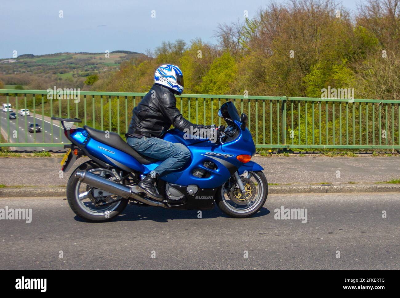 2000 Suzuki Gsx 600 Fy Motorbike rider; two wheeled transport, motorcycles, vehicle, roads, motorbikes, motorcycle bike riders motoring in Chorley, UK Stock Photo