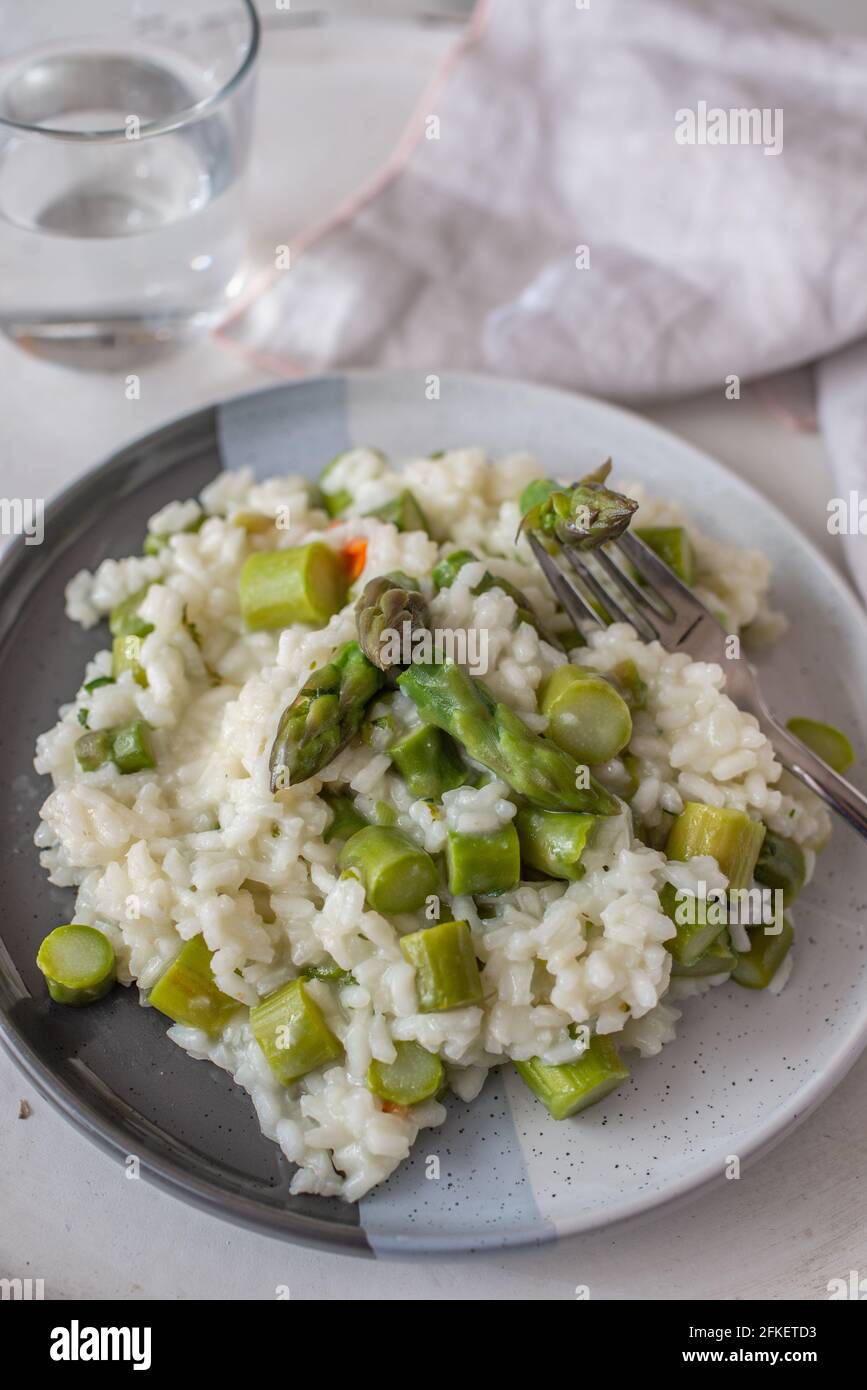 Spring food; Delicious risotto with asparagus and wild garlic Stock ...