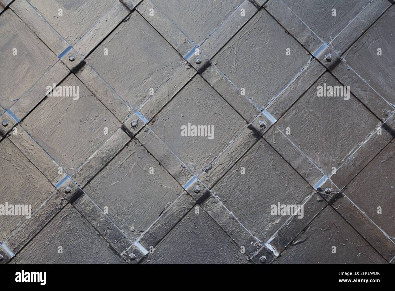 Image of metal painted surface with ornament of rhombus Stock Photo