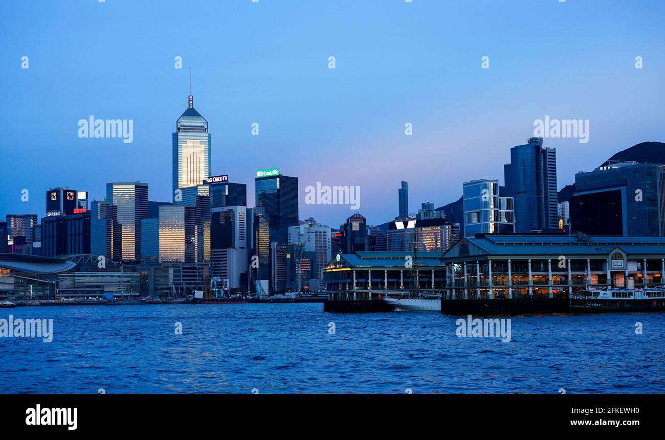 sunset view in Hong Kong, Kow Loon district, Central district in Hong Kong. Victoria Harbour. Illustrative editorial Stock Photo