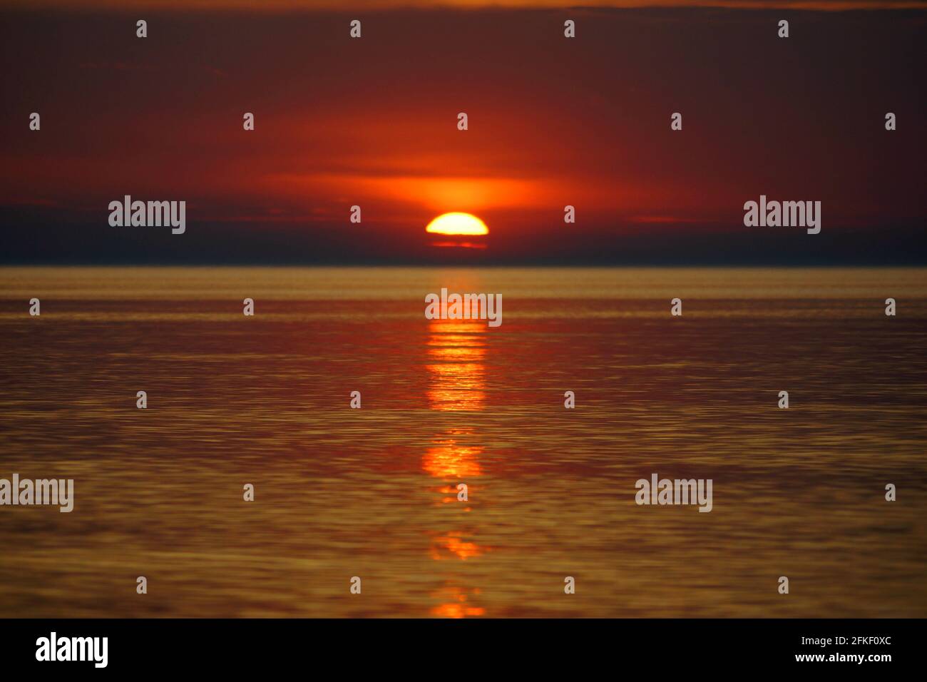 Tropical sunset on the beach. Ao-Nang. Krabi. Stock Photo