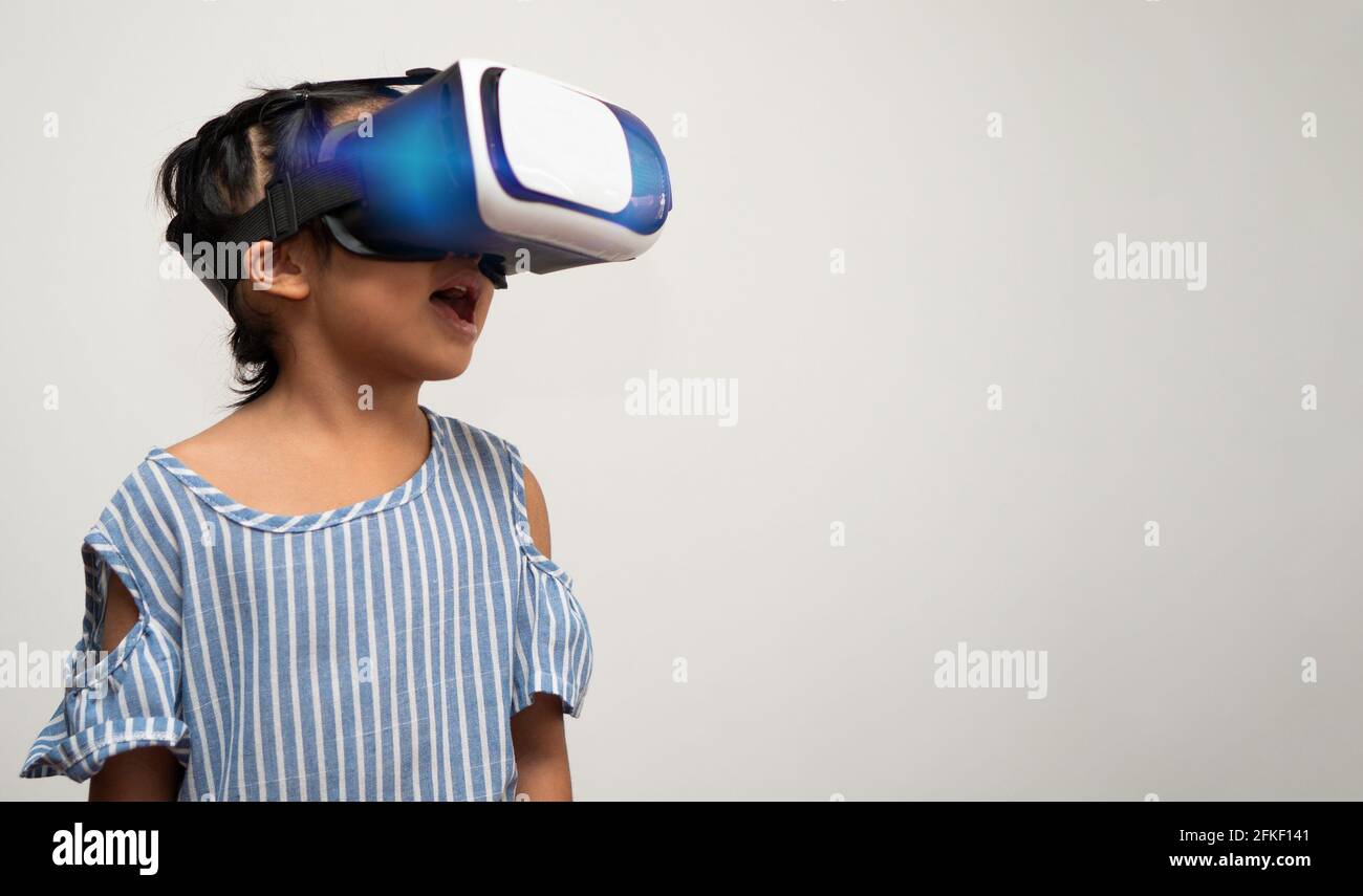 Little Asian girl child with virtual reality headset is exciting for new  experiencing. Concept of 3D gadget technology and virtual world gadgets  game Stock Photo - Alamy