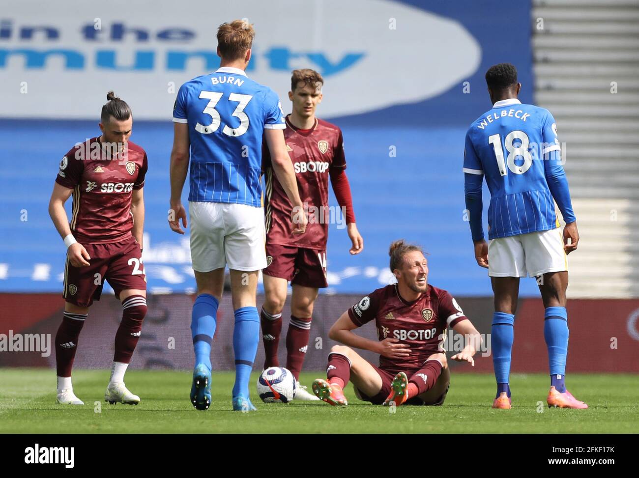 Brighton and Hove, England, 1st May 2021. Luke Ayling of Leeds United recovers from contact with Dan Burn of Brighton during the Premier League match at the AMEX Stadium, Brighton and Hove. Picture credit should read: Paul Terry / Sportimage Credit: Sportimage/Alamy Live News Stock Photo