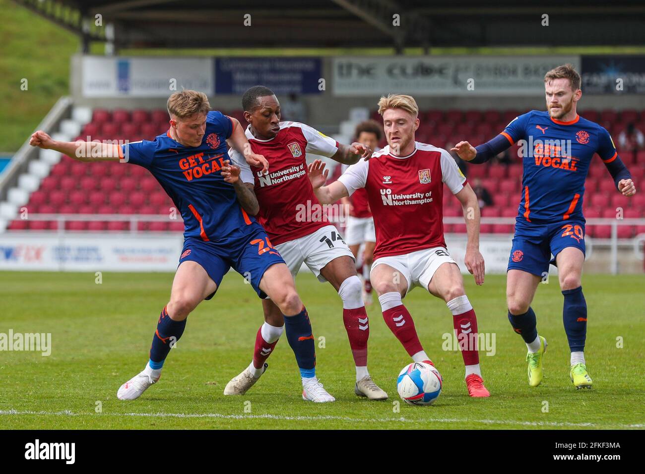 NORTHAMPTON, ENGLAND. MAY 1ST: Northampton Town's Mickel Miller is challenged by Blackpool's Daniel Ballard during the first half of the Sky Bet League One match between Northampton Town and Blackpool at the PTS Academy Stadium, Northampton on Saturday 1st May 2021. (Credit: John Cripps | MI News) Credit: MI News & Sport /Alamy Live News Stock Photo