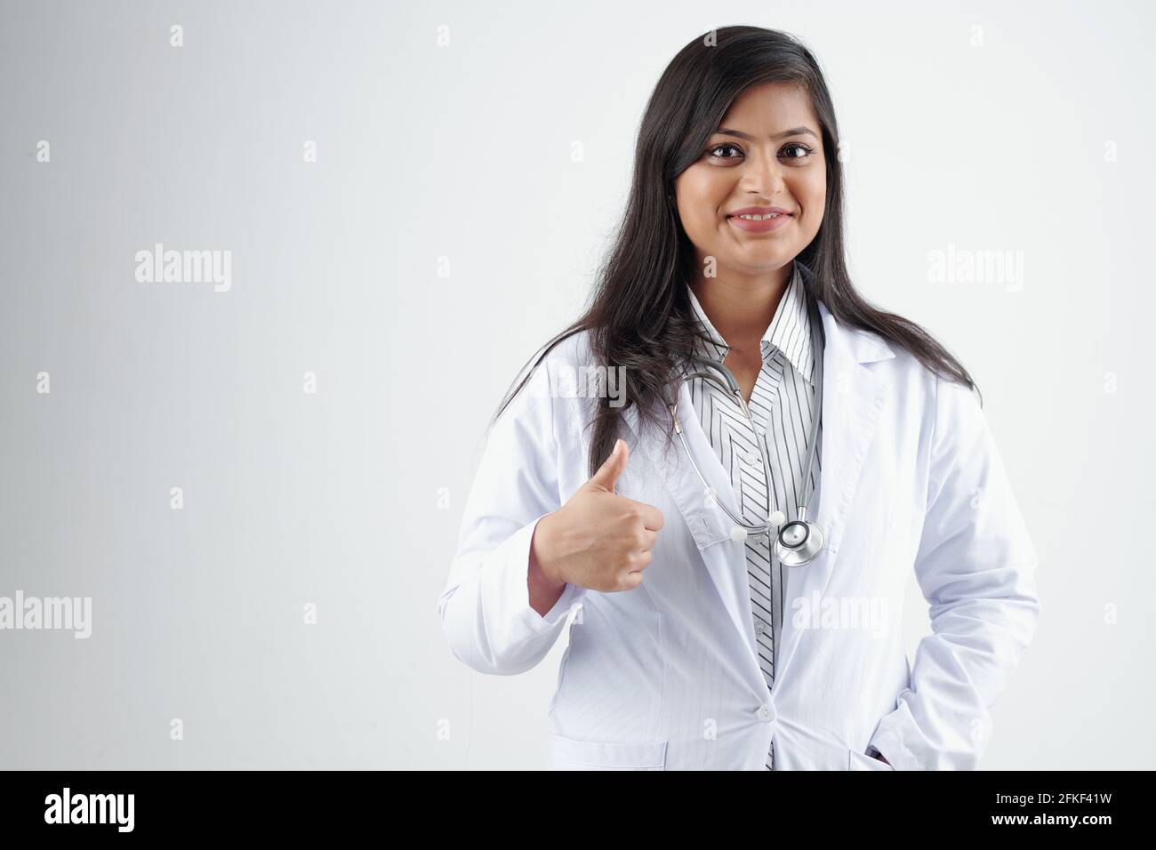 Female indian doctor thumbs up hi-res stock photography and images - Alamy