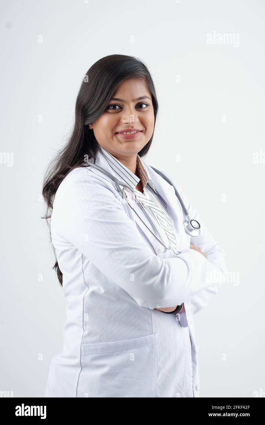 Smiling indian female doctor arms hi-res stock photography and images ...
