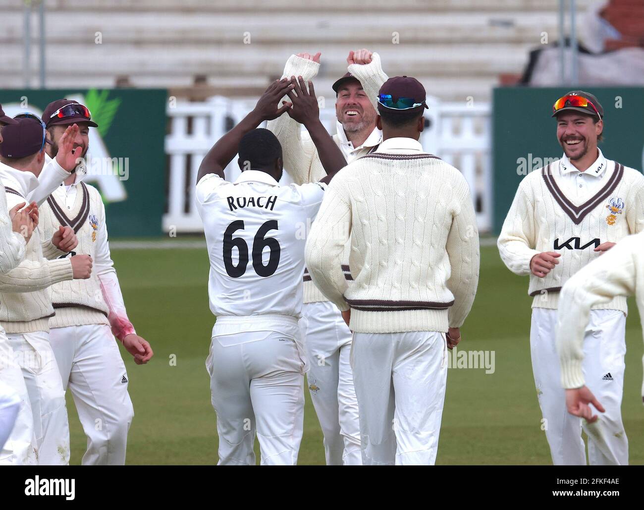 1 May, 2021. London, UK. Surrey’s Kemar Roach celebrates with team mates after getting the wicket of Hampshire’s Liam Dawson as Surrey take on Hampshire in  the County Championship at the Kia Oval, day three David Rowe/Alamy Live News Stock Photo