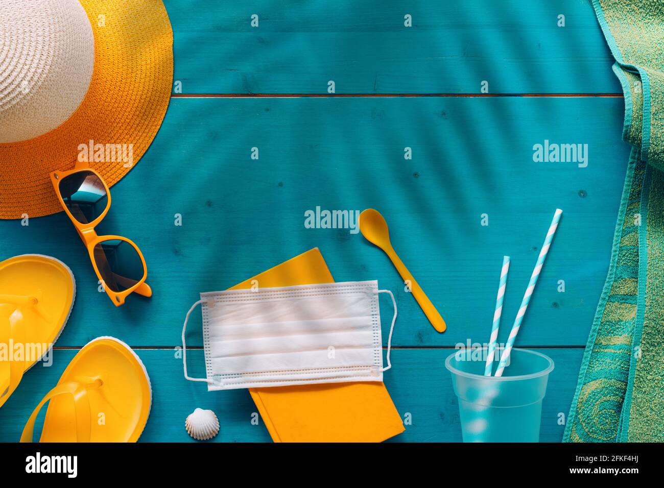 Covid-19 pandemics summertime seaside holiday concept, flat lay top view Stock Photo