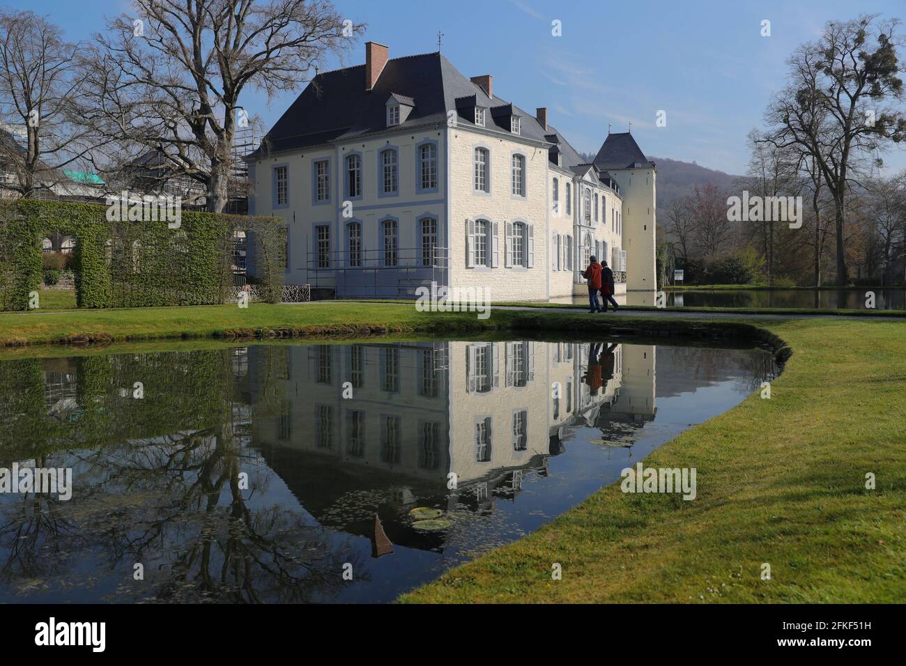 Namur, Belgium. 1st May, 2021. Tourists visit the Water Gardens of Annevoie in Annevoie-Rouillon, Namur, Belgium, May 1, 2021. The Water Gardens of Annevoie were designed and built by Charles-Alexis de Montpellier in the 18th century, with the combination of three ideas: 'art enhancing nature', 'art in tune with nature' and 'art imitating nature'. In 1930 the Gardens were opened for the general public. In 1982, the entire estate, including the gardens and the buildings, were listed as Historical Monuments. Credit: Zheng Huansong/Xinhua/Alamy Live News Stock Photo