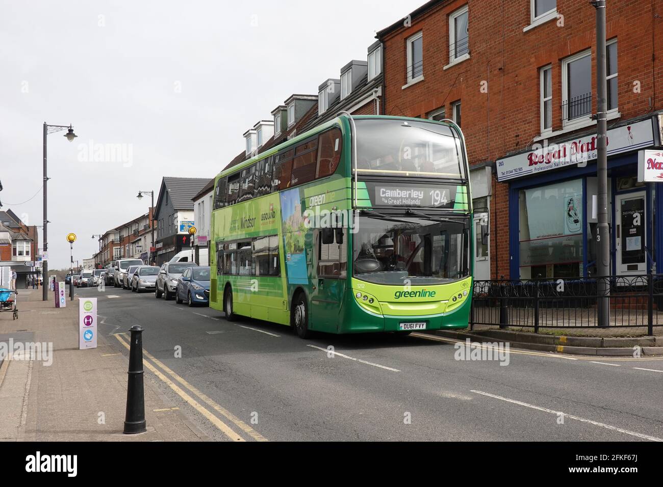 Reading Buses Greenline livery Alexander Dennis Enviro 400 on Route 194 in Crowthorne High Street Stock Photo