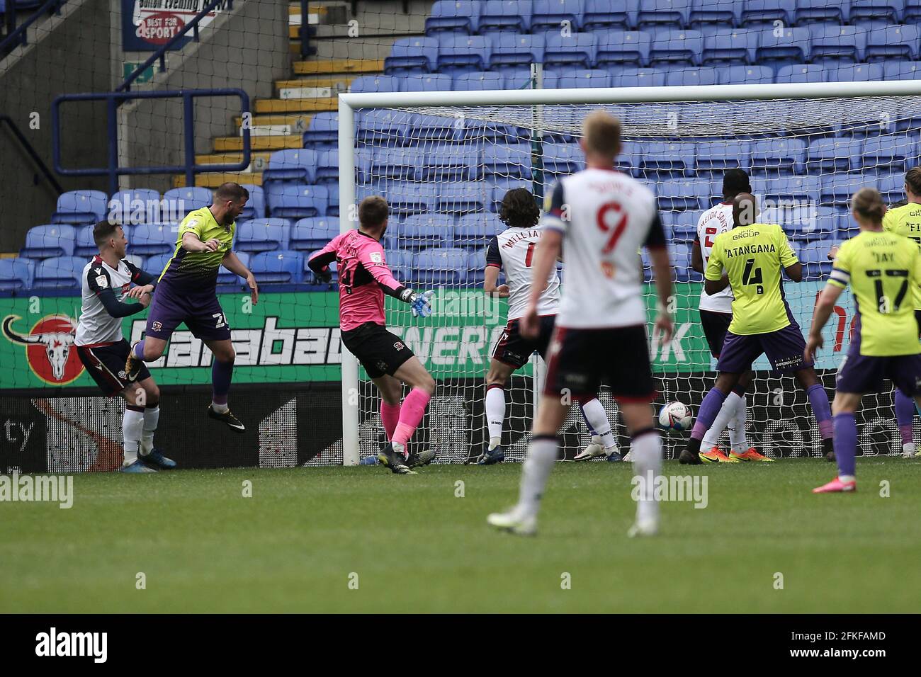 Pierce Sweeney of Exeter City scores a 96th minute winner during the Sky Bet League 2 behind closed doors match between Bolton Wanderers and Exeter City at the Reebok Stadium, Bolton, England on 1 May 2021. Photo by Dave Peters / PRiME Media Images. Stock Photo