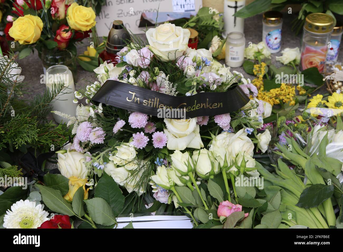 05/01/2021, Potsdam, Germany,.In front of the Thusnelda-von-Saldern-Haus in  Potsdam, many people place bouquets of flowers. Even two days after the  fatal act of violence in a Potsdam dormitory for the disabled, many