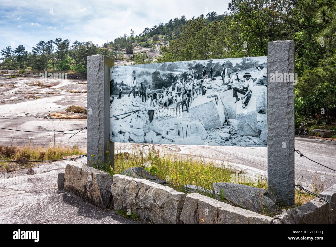 Stone Mountain Quarry Exhibit near Atlanta, Georgia, with photographic historical marker showing quarrymen c1890 working at the site. (USA) Stock Photo