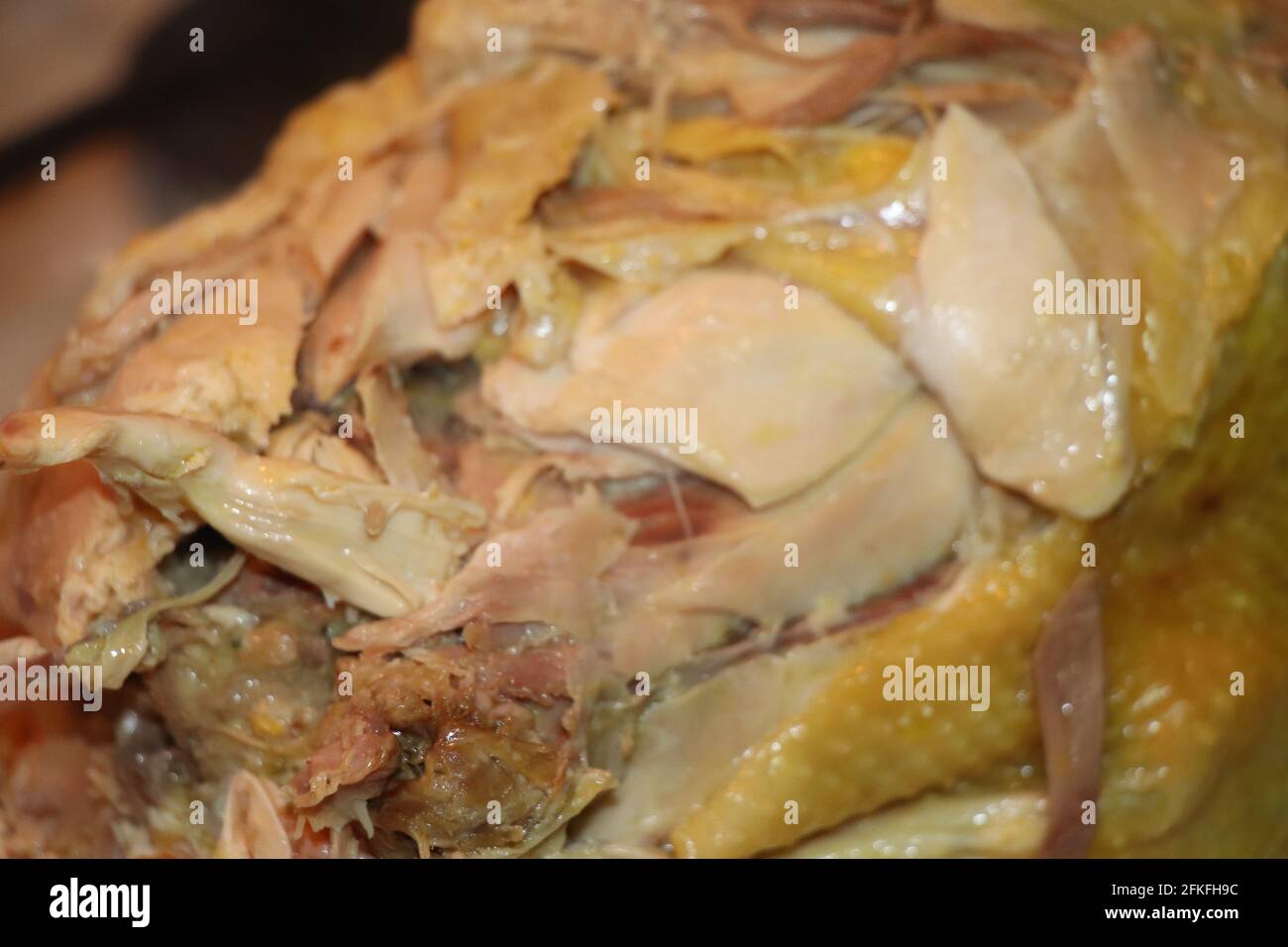 homemade stuffed capon on wooden cutting board Stock Photo
