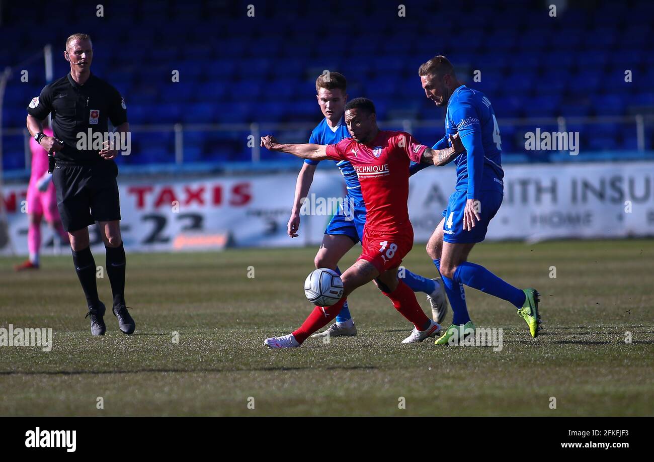 HARTLEPOOL, UK. MAY 1ST Chesterfield's Nathan Tyson goes past Hartlepool United's Mark Shelton and Hartlepool United's Gary Liddle during the Vanarama National League match between Hartlepool United and Chesterfield at Victoria Park, Hartlepool on Saturday 1st May 2021. (Credit: Michael Driver | MI News) Credit: MI News & Sport /Alamy Live News Stock Photo