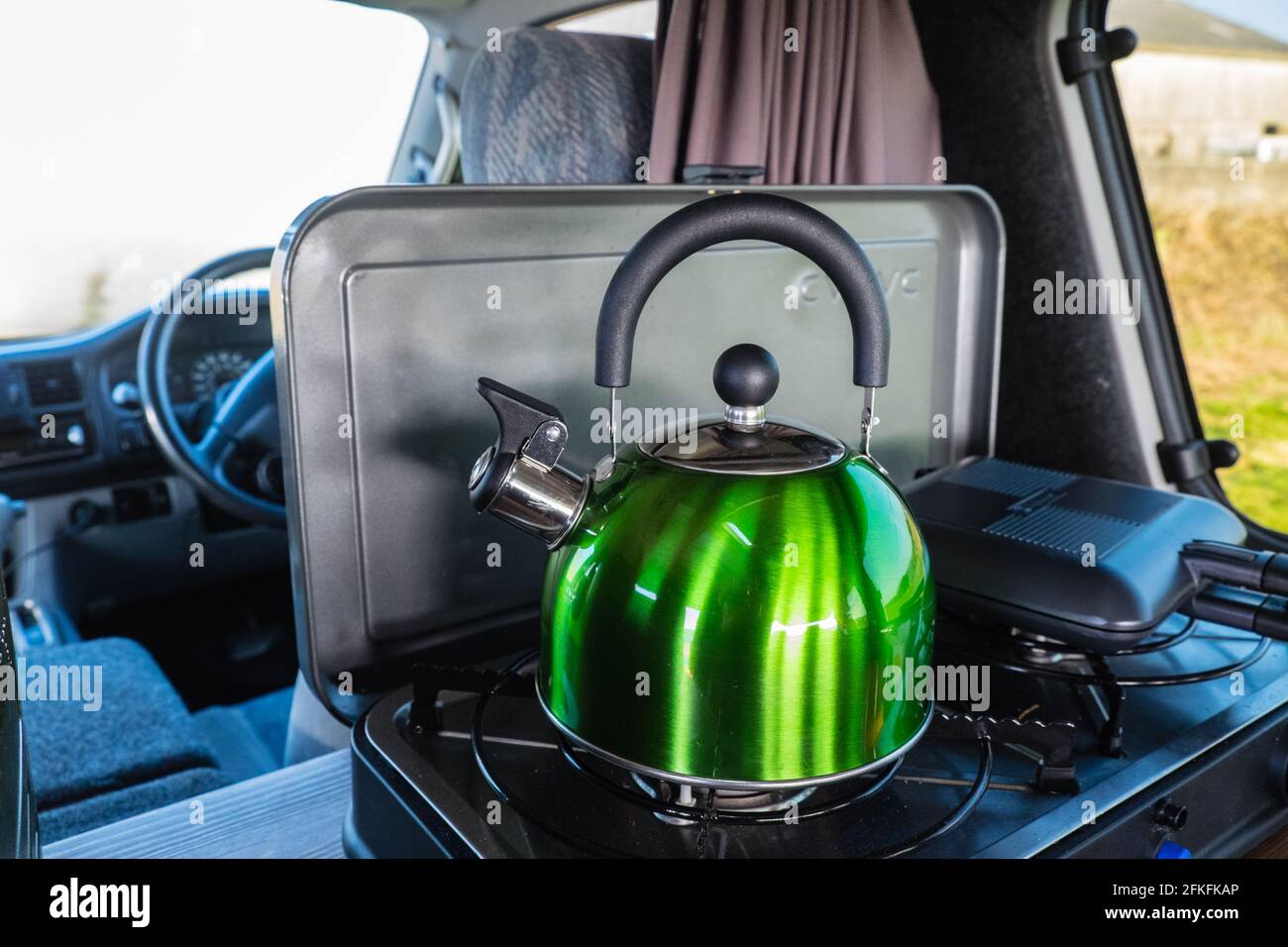 Making,a,pot,of,tea,Boiling,a,traditional,whistling,kettle,on,a,Cradoc