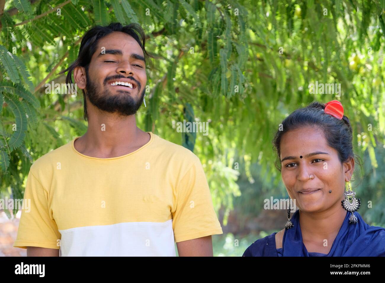 Shallow focus of a happy young Indian couple in a park at daytime Stock ...