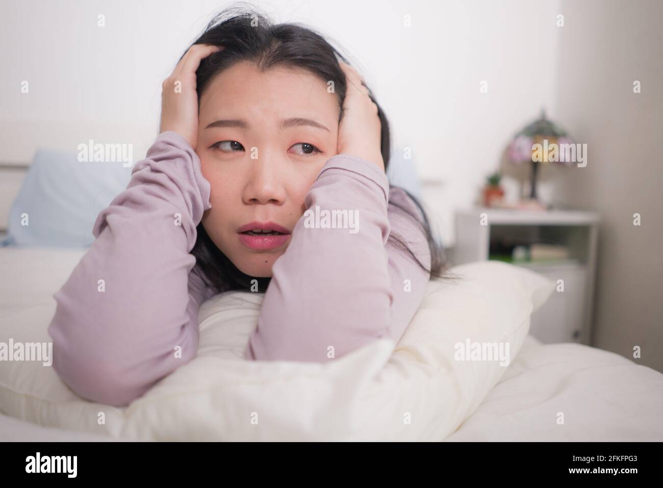 young Asian woman depressed - young beautiful and sad Korean girl on ...