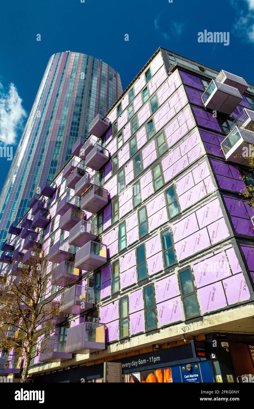 1 May 2021, London, UK - The Stratford Halo development with cladding stripped off, the cladding scandal in the UK emerged in the wake of the Grenfell Tower fire after fire safety regulations have been changed for flammable cladding to be removed Stock Photo