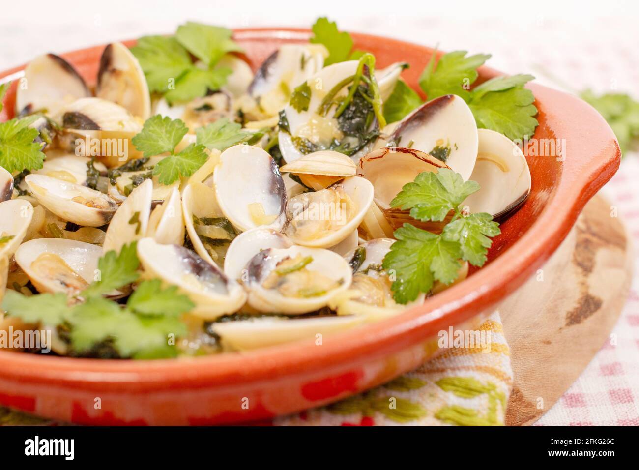 Typical starter portuguese meal of clams with garlic, olive oil and