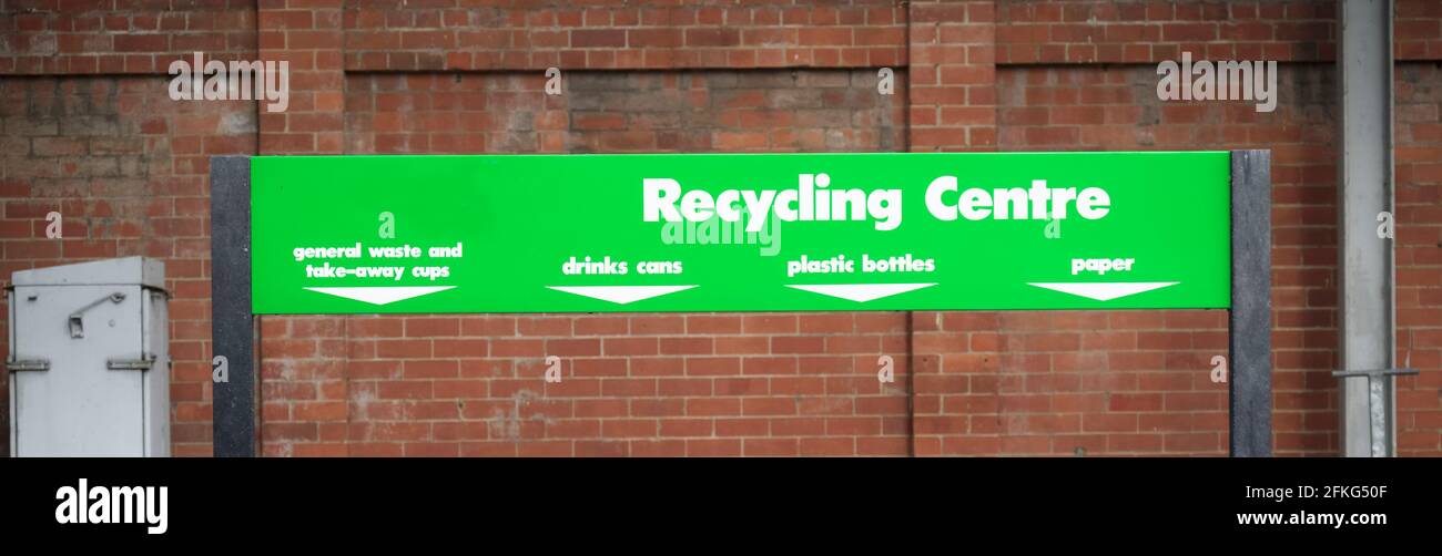 Recycling centre bin bags colour coded for plastic paper glass and
