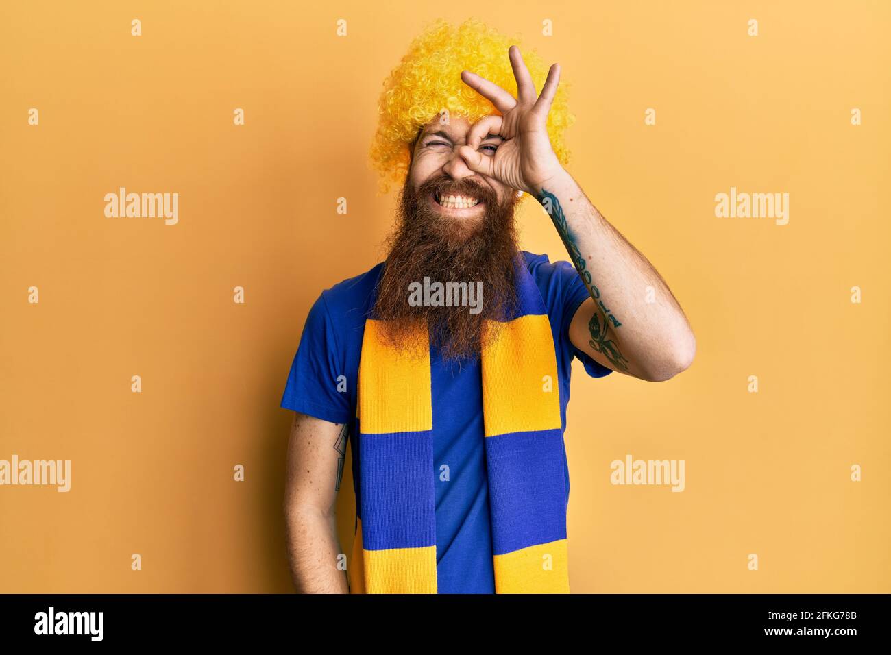 Redhead man with long beard football hooligan cheering game wearing ...