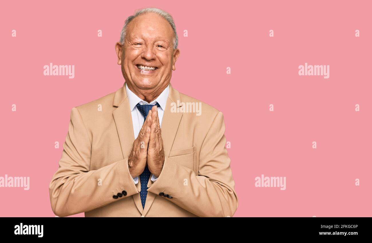 Caucasian elderly male praying hi-res stock photography and images - Alamy