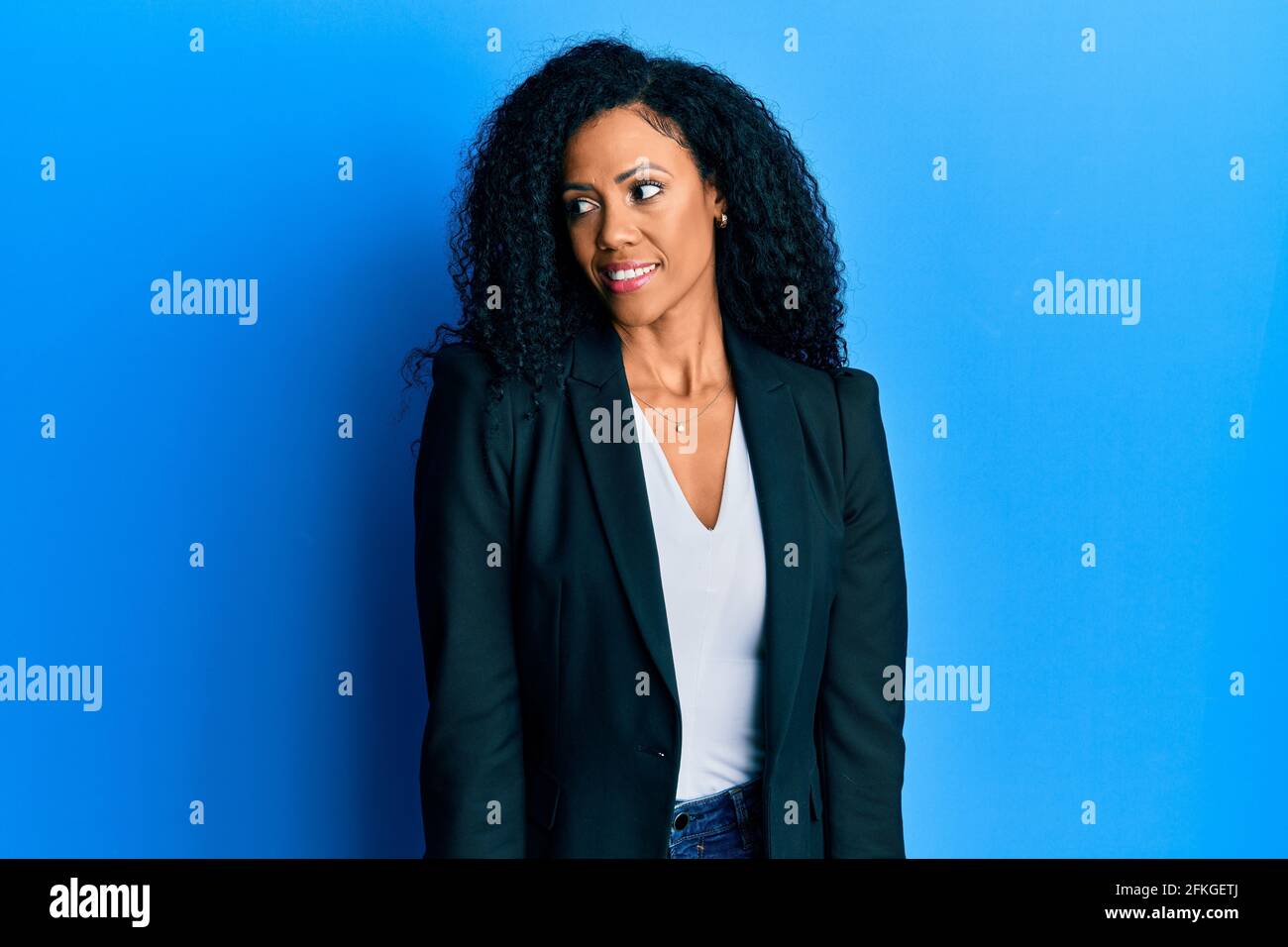 Middle age african american woman wearing business clothes smiling ...