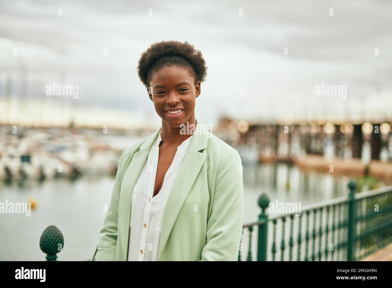 Young african american businesswoman smiling happy standing at the ...