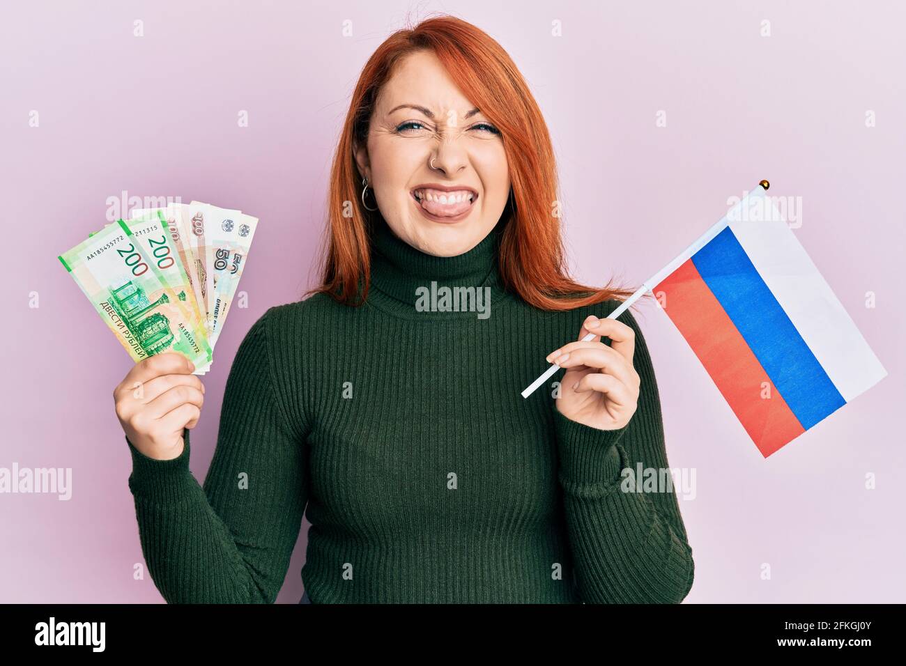 Premium Photo  Ireland flag ball smashing a russian ruble