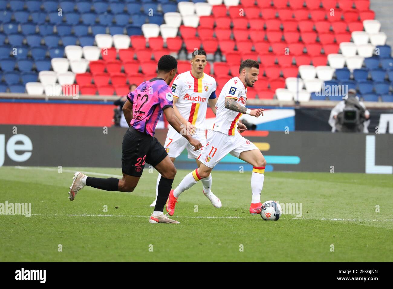 Paris, France, 1st May 2021, Jonathan CLAUSS 11 Lens duel Abdou DIALLO 22  PSG during the French championship Ligue 1 football match between Paris  Saint-Germain and RC Lens on May 1, 2021