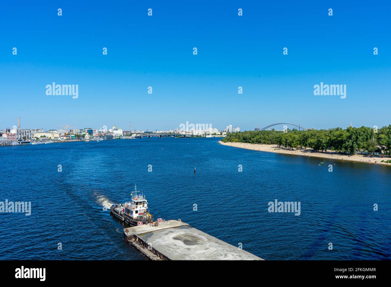 KYIV UKRAINE AUGUST 30 2020: Towboat with big platform on Dnypro