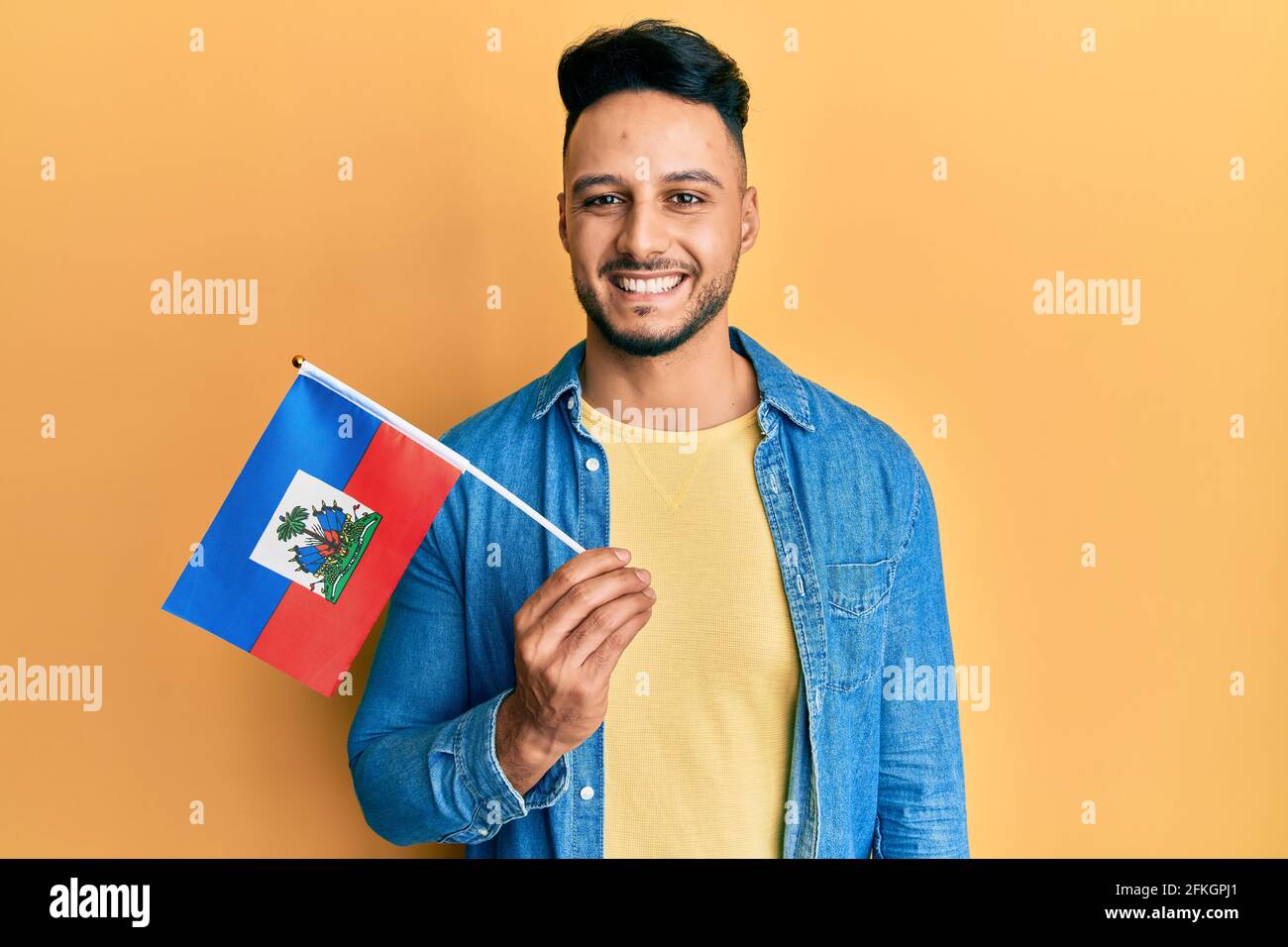 Happy smiling young happy haitian hi-res stock photography and images ...