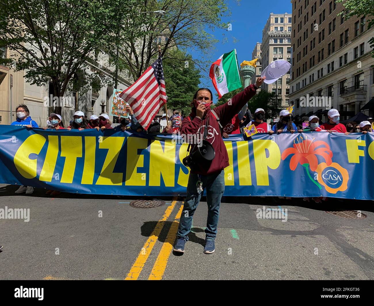 Washington, District of Columbia, USA. 1st May, 2021. May Day, or May 1, is celebrated as International WorkersÃ Day. Immigrant communities and their allies from around the United States came to Washington, DC to march for immigrant justice. With signs and chants, they called on the Biden administration and Congress to deliver immigration reform, stop deportations, create a pathway to citizenship for the DACA recipients, TPS holders, and all 11 million undocumented folks. Credit: Sue Dorfman/ZUMA Wire/Alamy Live News Stock Photo