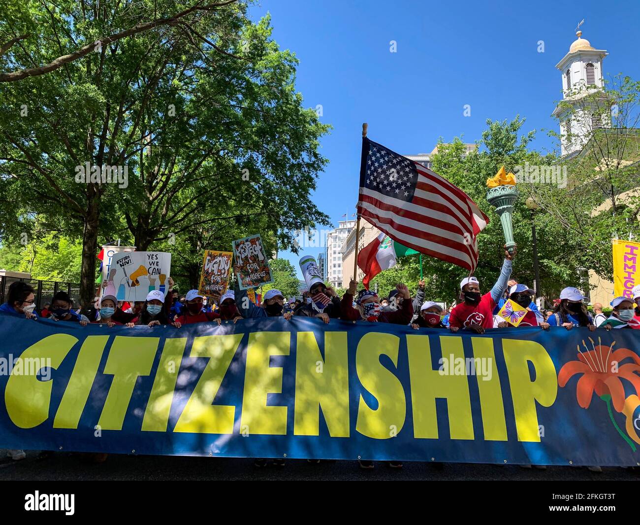 Washington, District of Columbia, USA. 1st May, 2021. May Day, or May 1, is celebrated as International WorkersÃ Day. Immigrant communities and their allies from around the United States came to Washington, DC to march for immigrant justice. With signs and chants, they called on the Biden administration and Congress to deliver immigration reform, stop deportations, create a pathway to citizenship for the DACA recipients, TPS holders, and all 11 million undocumented folks. Credit: Sue Dorfman/ZUMA Wire/Alamy Live News Stock Photo