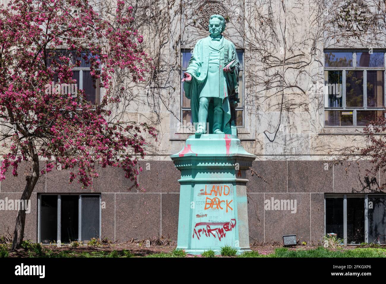 Defaced statue of Egerton Ryerson in the grounds of the University which carries his name in the Toronto downtown, Canada Stock Photo