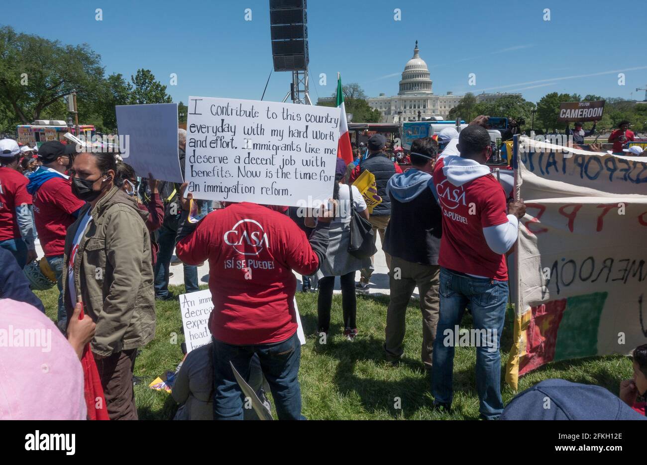 Demonstrators demanding the Biden administration make progress on immigration reform, at a rally on the National Mall on May Day, known as International Workers Day.  More than 25 groups participated in a march which originated at Black Lives Matter Plaza near the White House. May 1, 2021, Washington, DC Stock Photo