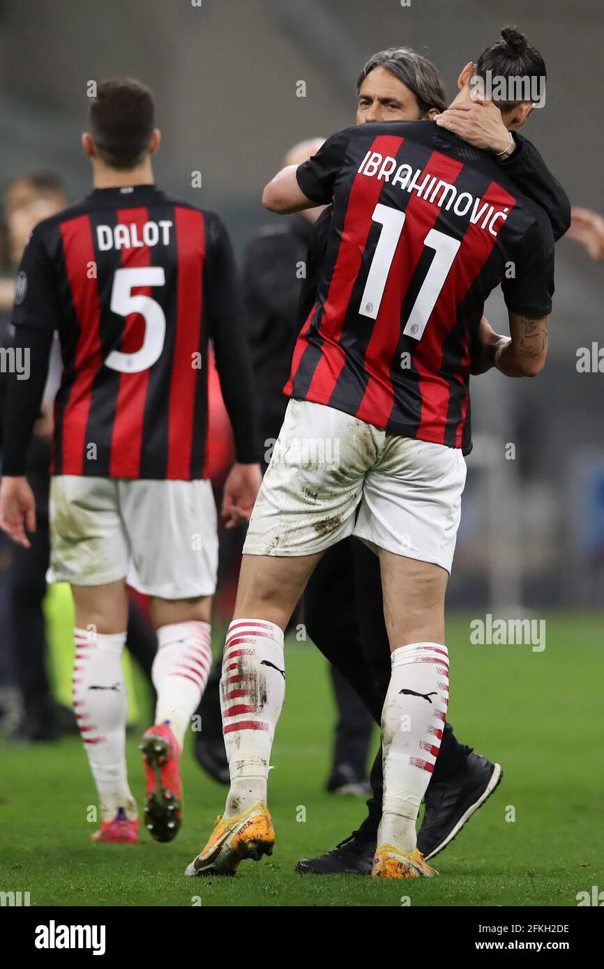 Milan, Italy, 1st May 2021. Zlatan Ibrahimovic of AC Milan is embraced by Filippo Inzaghi Head coach of Benevento Calcio following the final whistle of the Serie A match at Giuseppe Meazza, Milan. Picture credit should read: Jonathan Moscrop / Sportimage Credit: Sportimage/Alamy Live News Stock Photo