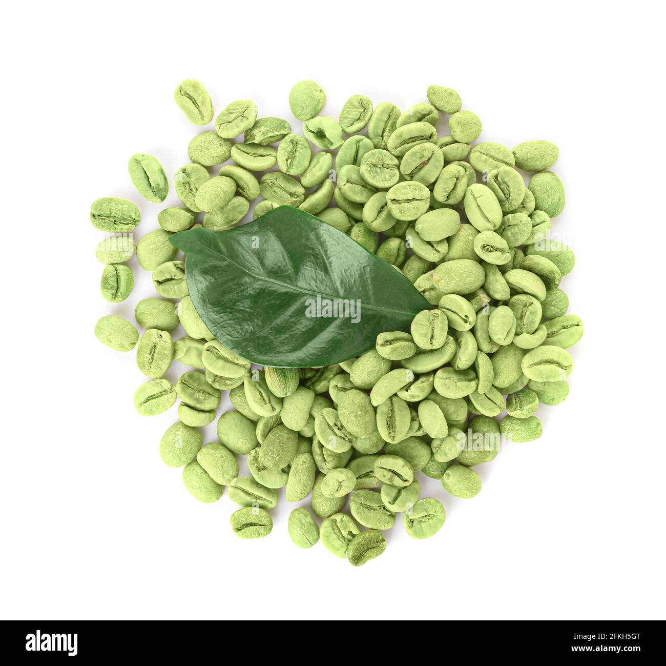 Green coffee beans and leaf on white background Stock Photo - Alamy