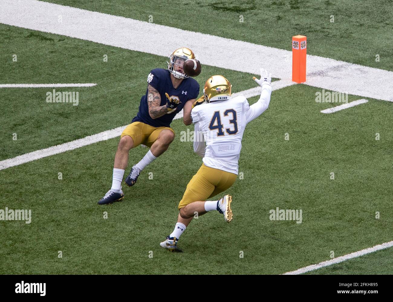 South Bend, Indiana, USA. 01st May, 2021. Notre Dame wide receiver Braden  Lenzy (0) catches the ball as Notre Dame defensive back Marcus Thorne (43)  defends during the Notre Dame Annual Blue-Gold