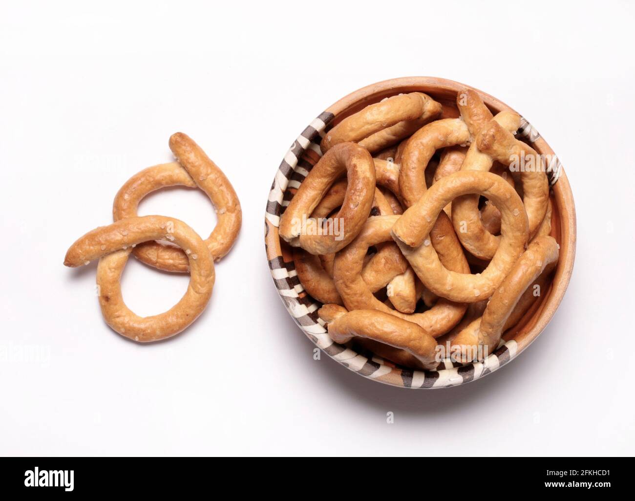 Salty pretzels isolated on white background. Directly above. Stock Photo