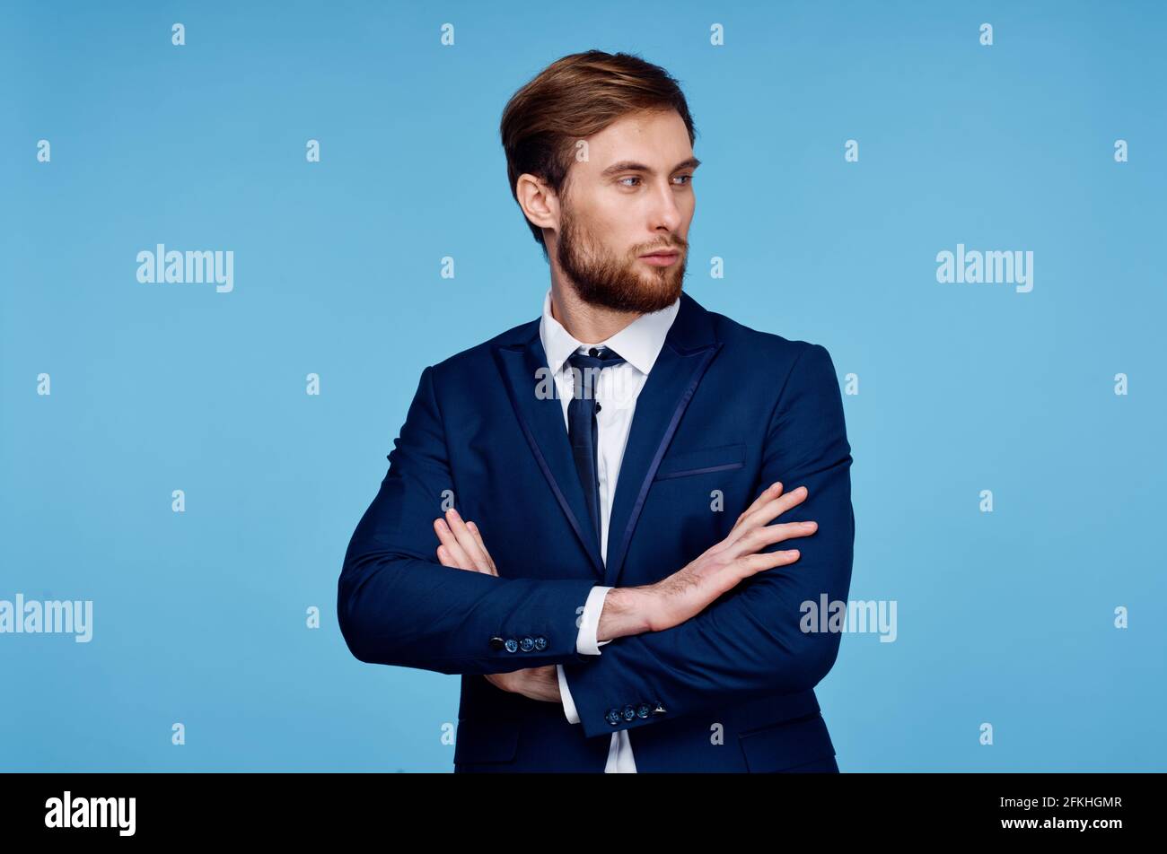 business man in suit blue background cropped view financial self ...